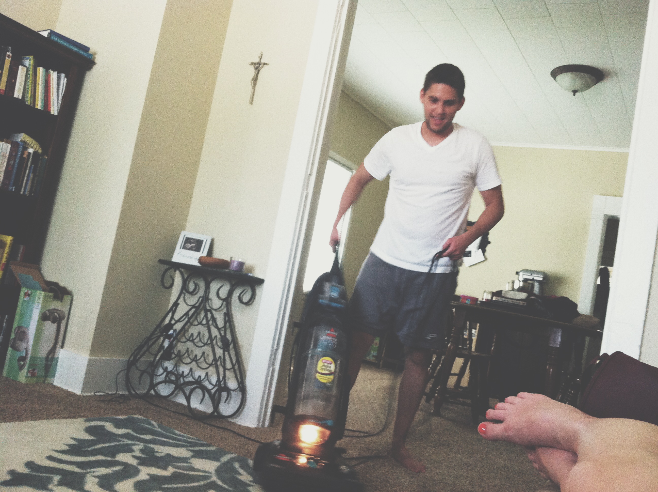 husband vacuuming