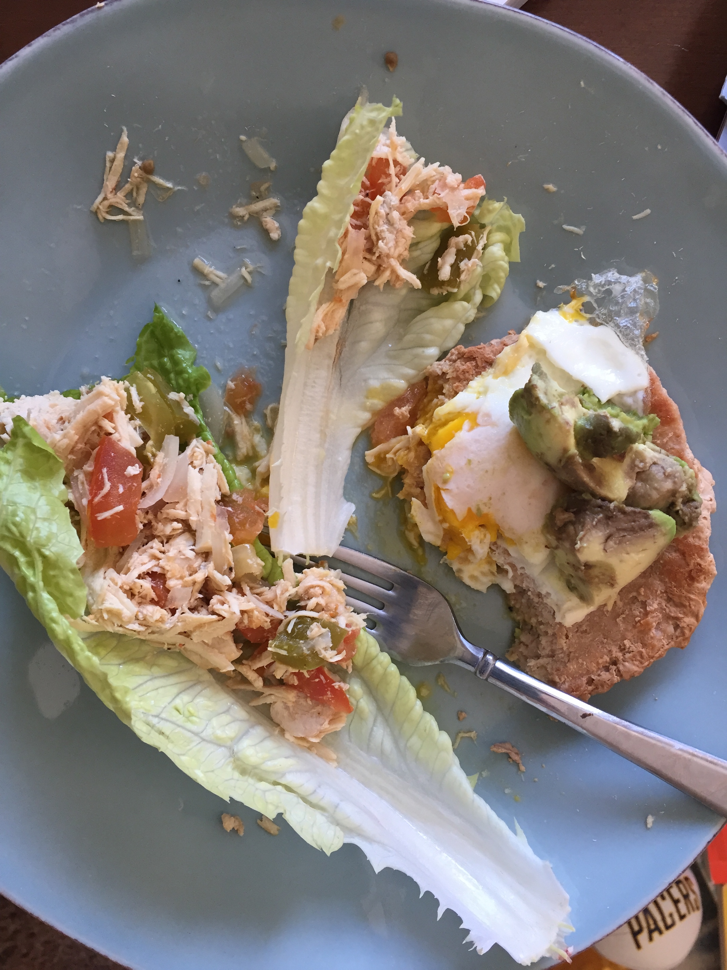 Whole30 compliant turkey burger with fried egg and avocado, chicken salad with homemade pale mayo, tomato, green pepper on lettuce bed